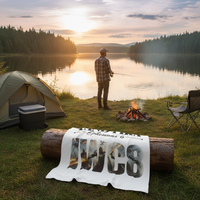 Stand Firm NWC8 blanket at campsite with young man fishing by lake in background