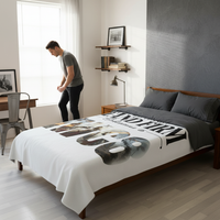 Stand Firm NWC8 blanket on bed with man getting dressed by window