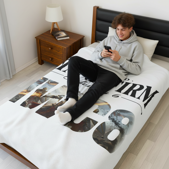 Teen boy with fluffy hair on bed with Stand Firm NWC8 blanket using phone